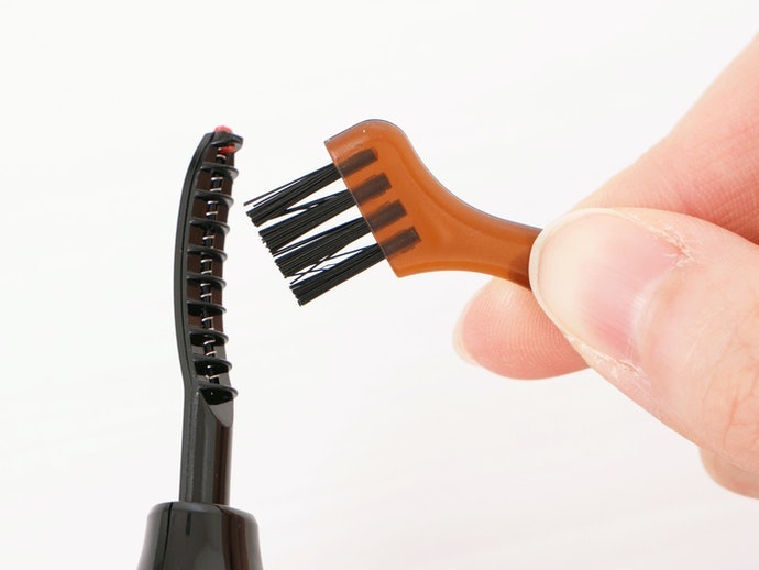 For Stick-Type Curlers, a Cleaning Brush Makes For Easy Maintenance
