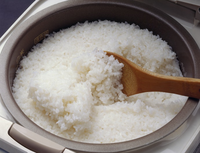 Stir Your Rice When It Finishes Cooking to Release Excess Moisture
